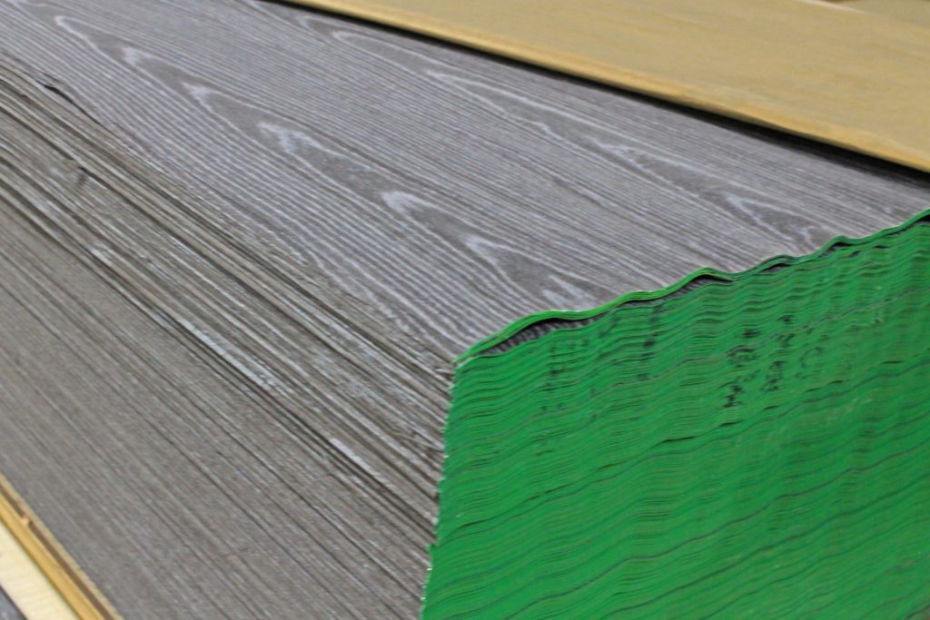 Close-up of grey colored reconstituted wood veneer at M. Bohlke Veneer.