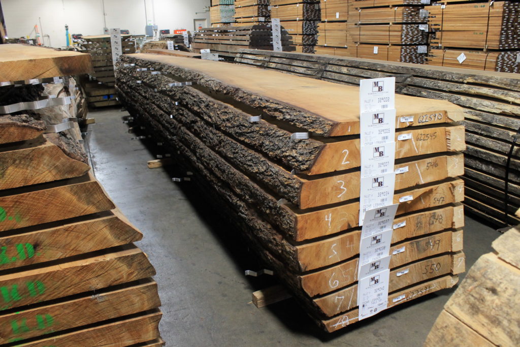 Stacked and surfaced live edge slabs in M. Bohlke Lumber warehouse in Hamilton, Ohio.