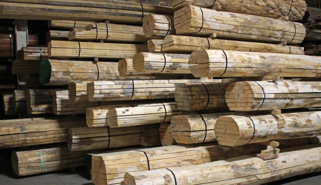 Stacks of European sycamore boule lumber inside Bohlke lumber warehouse.