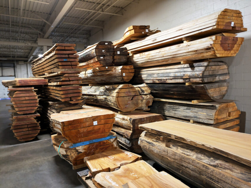 Stacked Keyaki live edge slabs. 